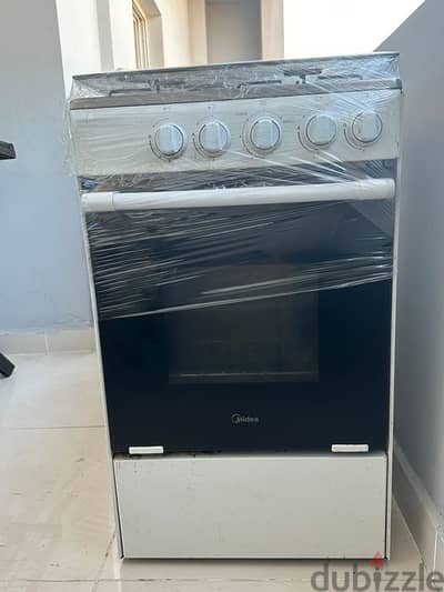 1 Year Used Gas & Electric Stove in Perfect Condition