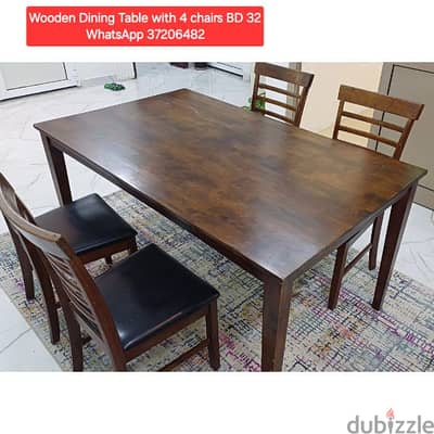 Wooden Dining Table with 4 chairs and other items for sale