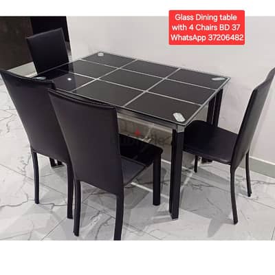 Glass Dining table with 4 chairs and other stuff for sale