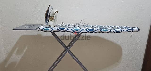 Iron box with ironing table