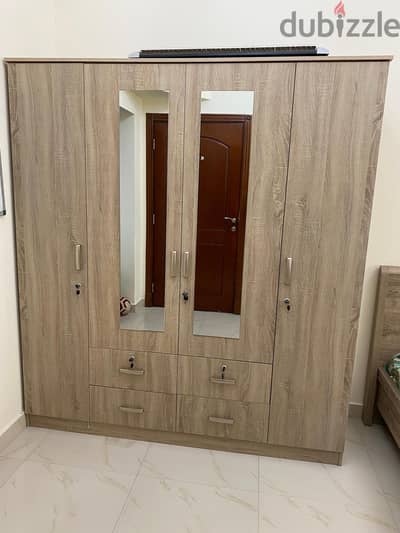 King size bed, 4-door wardrobe, dressing table, 2-door cupboard, bed