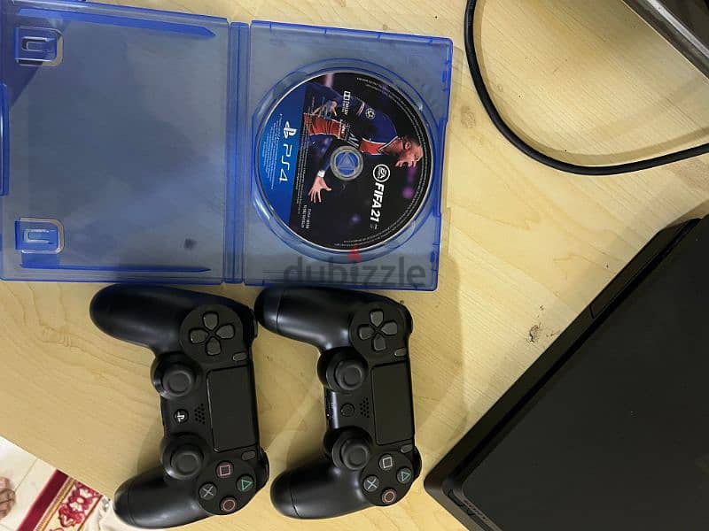 ps4 500 GB with 2 controllers and with fifa 21 CD 1