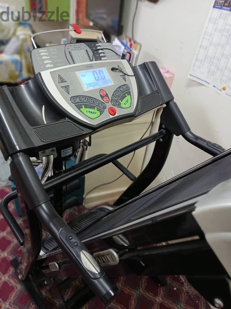 Treadmill with belly and thigh massager 2