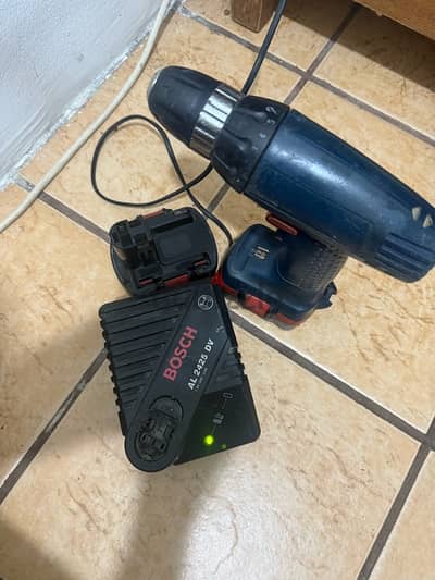 drill for sale with two batteries and original charger