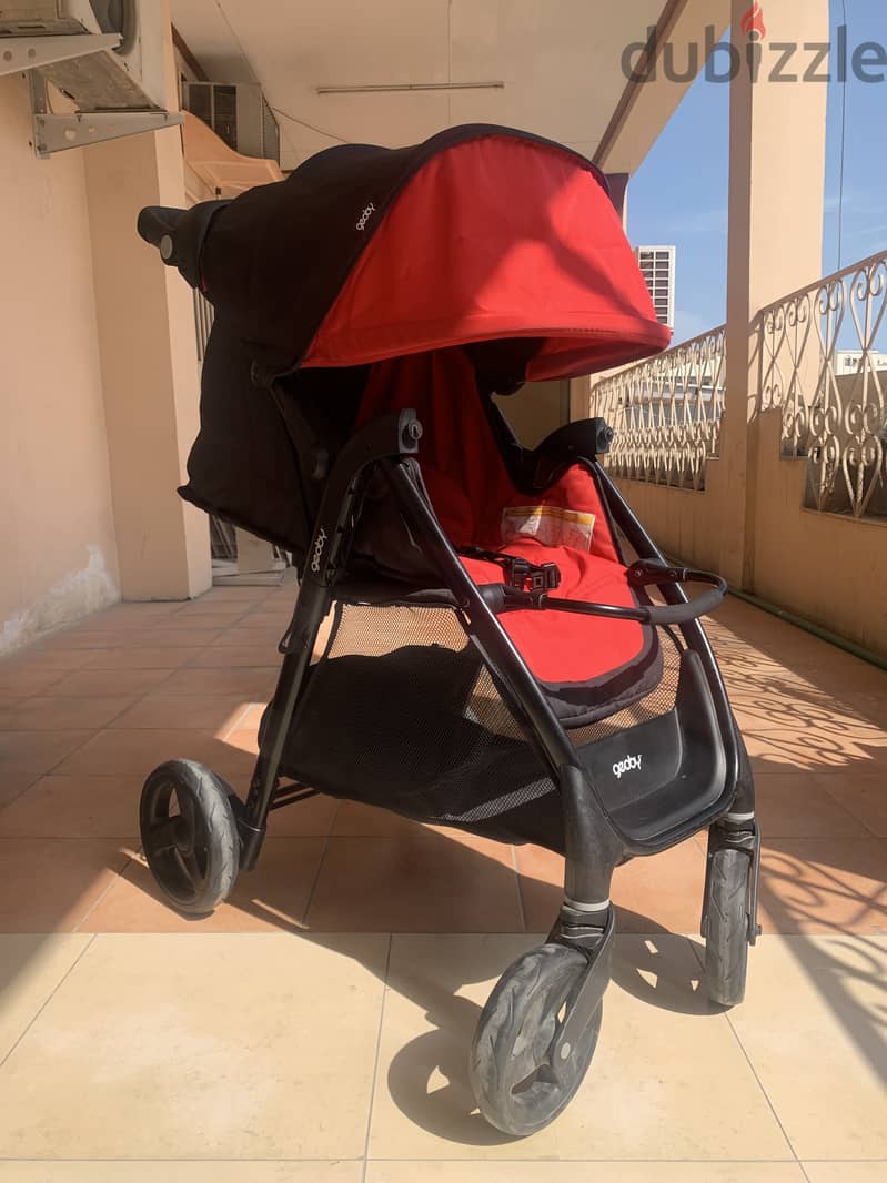 MOON STROLLER USED BUT VERY GOOD CONDITION PRICE 10 BHD 1