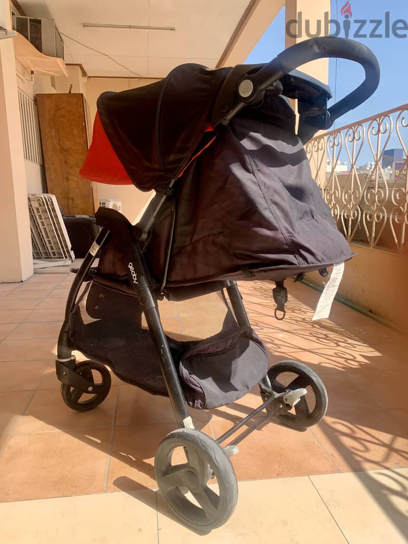 MOON STROLLER USED BUT VERY GOOD CONDITION PRICE 10 BHD 2