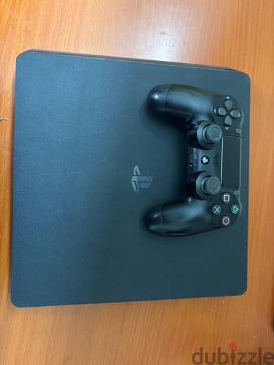 ps4 512 gb with one controller and 4 games