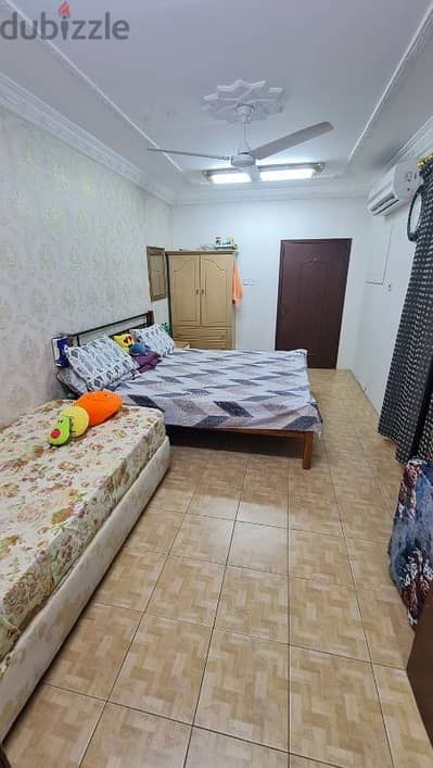 Fully furnished room is available for female in a family apartment