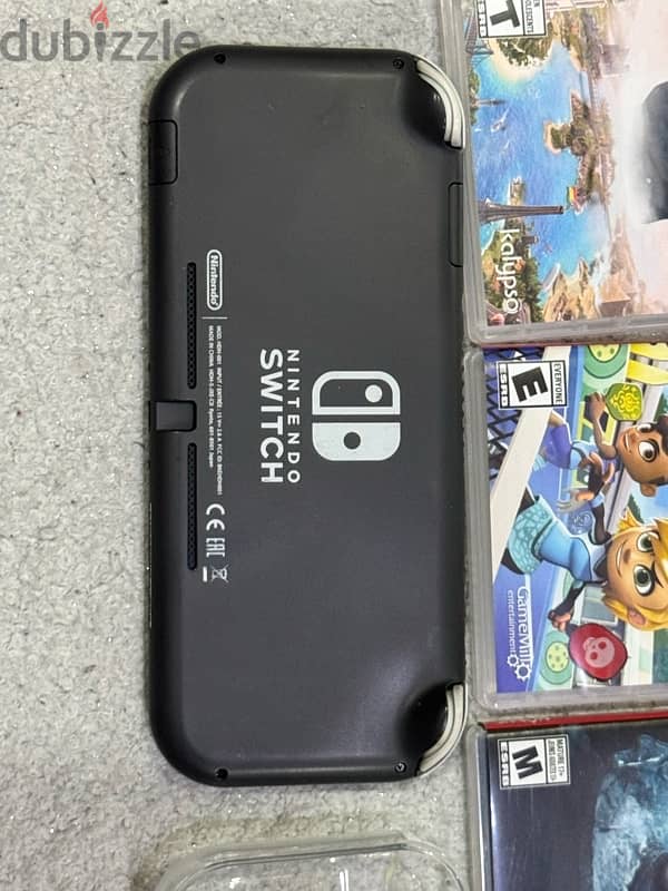 nintendo switch lite with, ac charger, games,cover grip&more 1