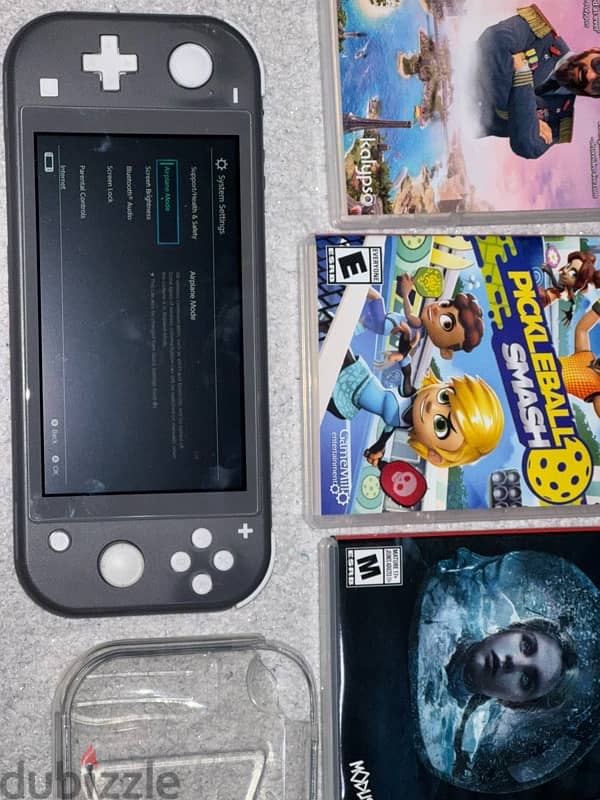 nintendo switch lite with, ac charger, games,cover grip&more 5