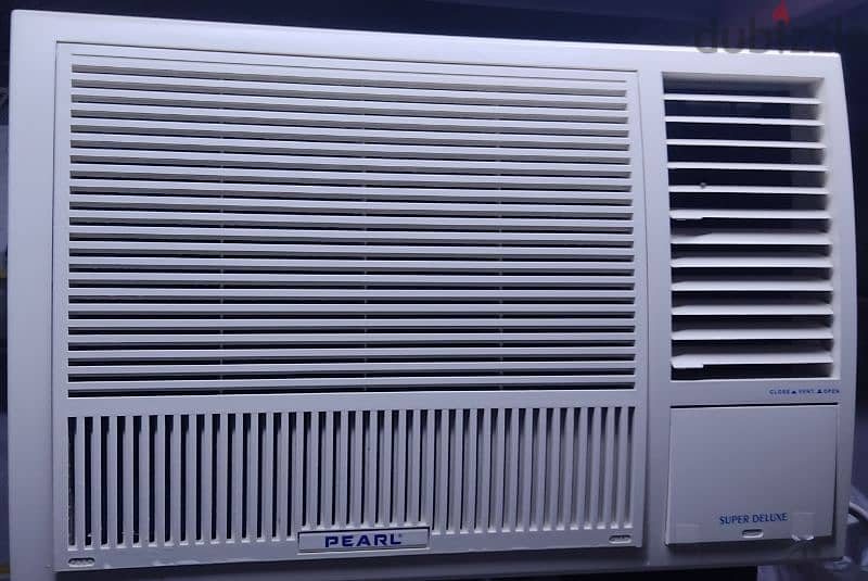 slightly used pearl window AC for sale 0