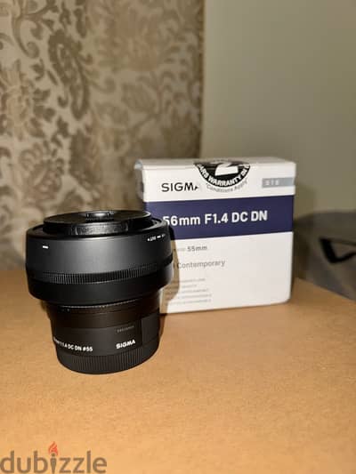 Sigma 56mm Sony lens Under Warranty Excellent condition not used much