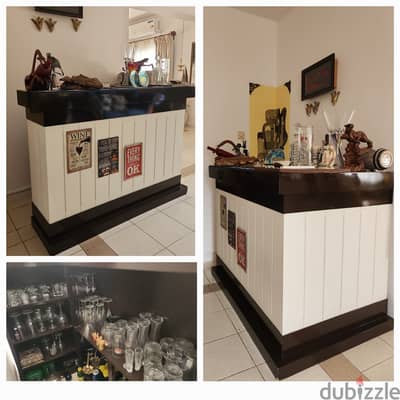 A preloved bar counter for sale, with glasses