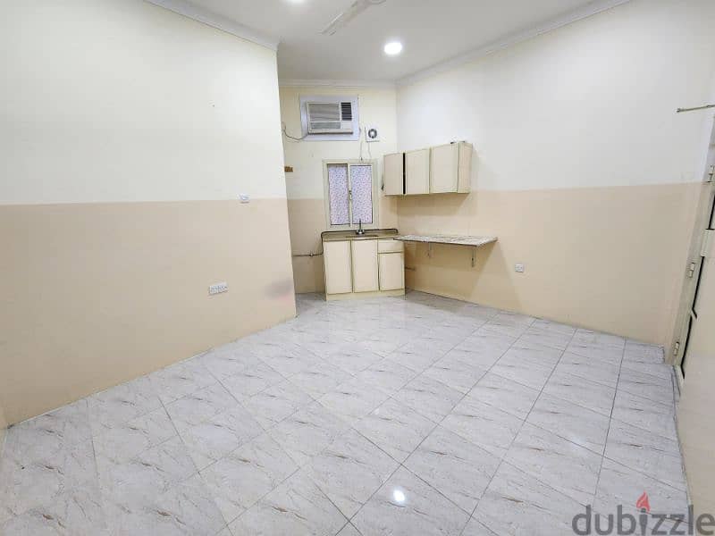 STUDIO FOR RENT IN MUHARRAQ SEMI FURNISHED WITH EWA 1