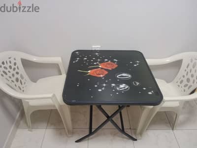 Foldable table with chairs