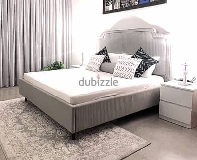 BEDFRAME AND HEADBOARD - UPHOLSTERED GRAY FABRIC