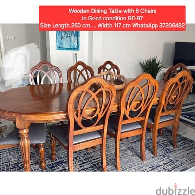 Wooden Dining Table with 8 chairs & other items for sale