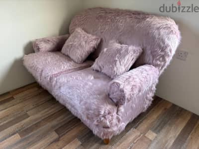 Fluffy pink sofa