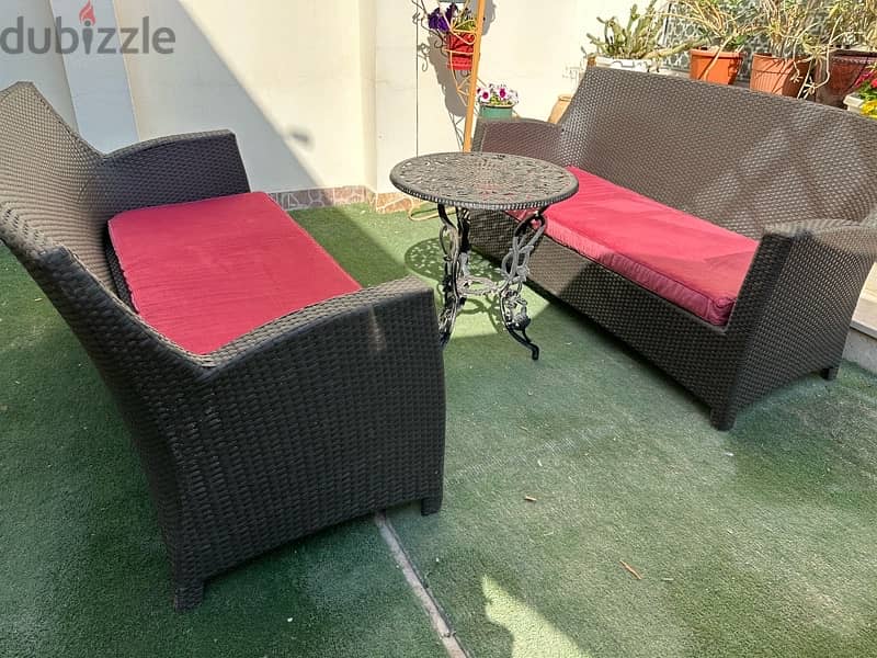 two garden sofas with new cushions 0