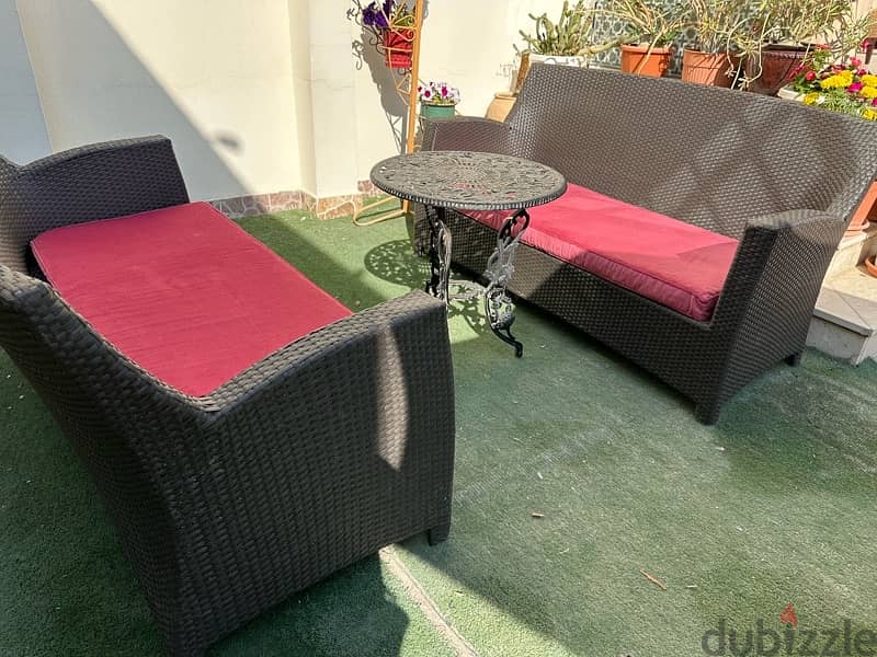 two garden sofas with new cushions 2