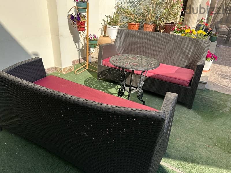 two garden sofas with new cushions 6