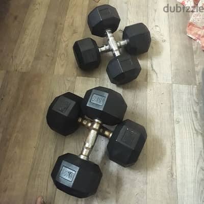 2 pairs of Dumbbells one20kg and 30kg