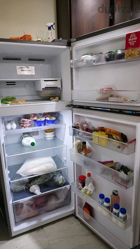 Double door fridge in good condition 1