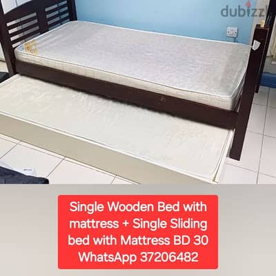 Single wooden bed with mattress + sliding single bed for sale