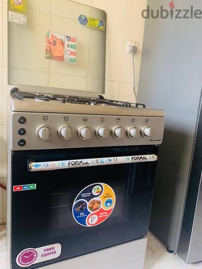 Cooking range with gas cylinder