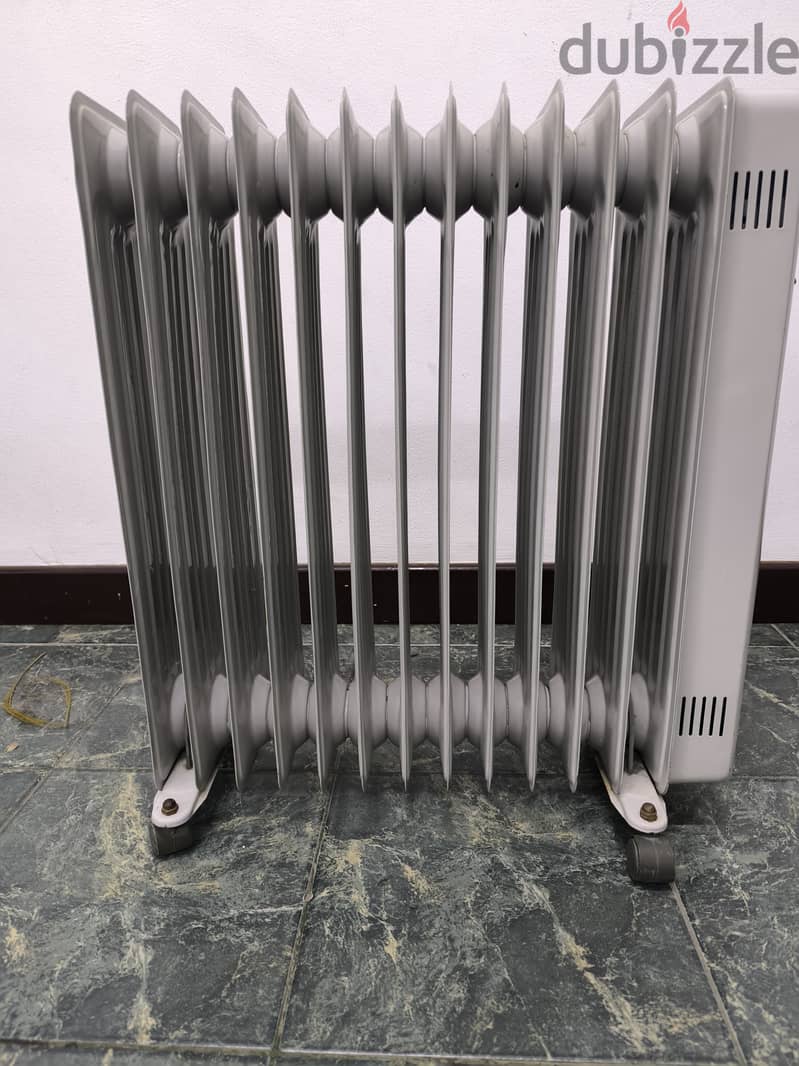 Geepas oil heater & National fan 1