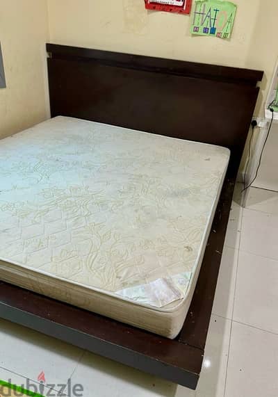 King Size Bed with mattress with 2 side tables.