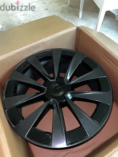 Tesla Model x stock rims with aero caps for sale / 4 rims 22 inch