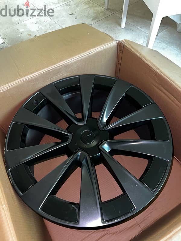 Tesla Model x stock rims with aero caps for sale / 4 rims 22 inch 0