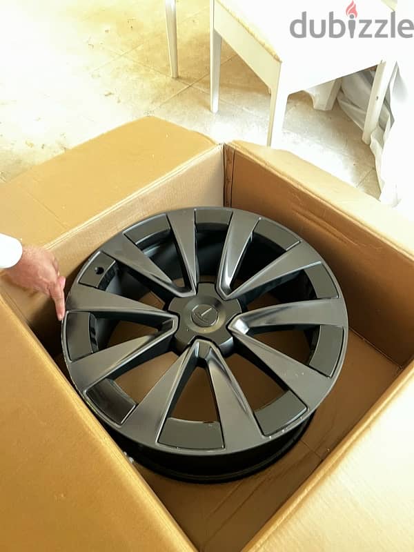 Tesla Model x stock rims with aero caps for sale / 4 rims 22 inch 1