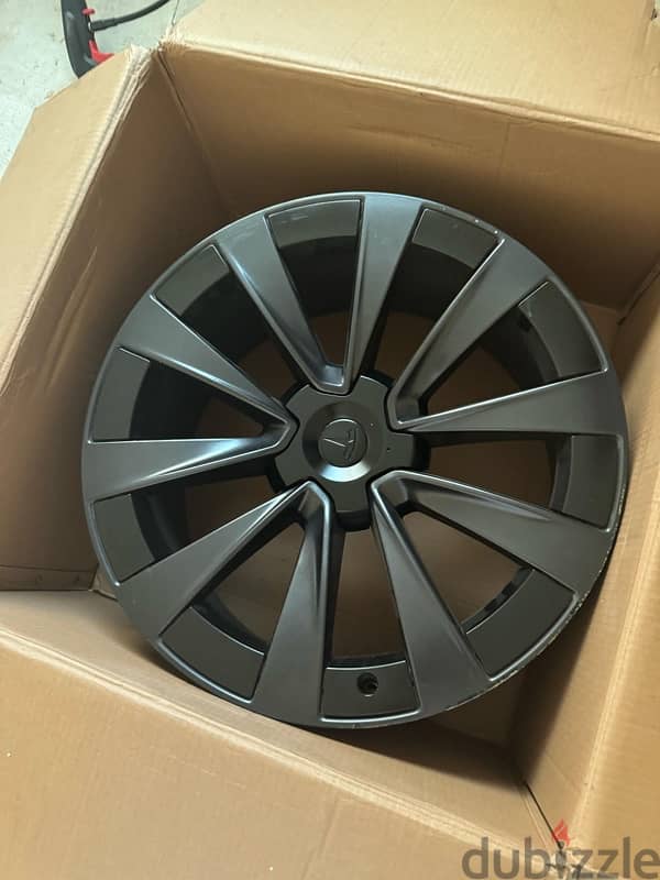 Tesla Model x stock rims with aero caps for sale / 4 rims 22 inch 5