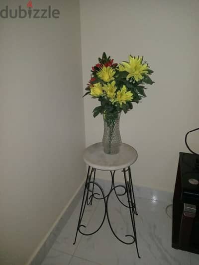 Flower vase and stand with plastic flowers