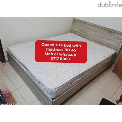 Queen size bed with mattress and other household items for sale