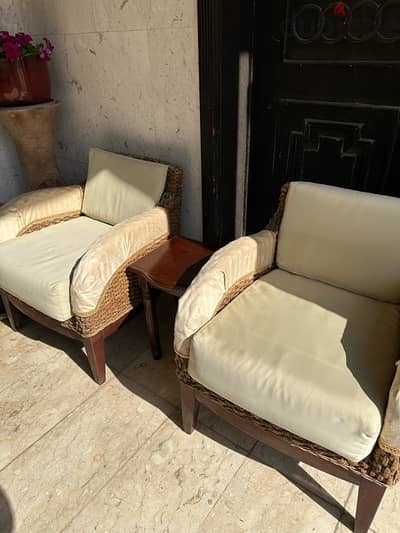 two rattan chairs