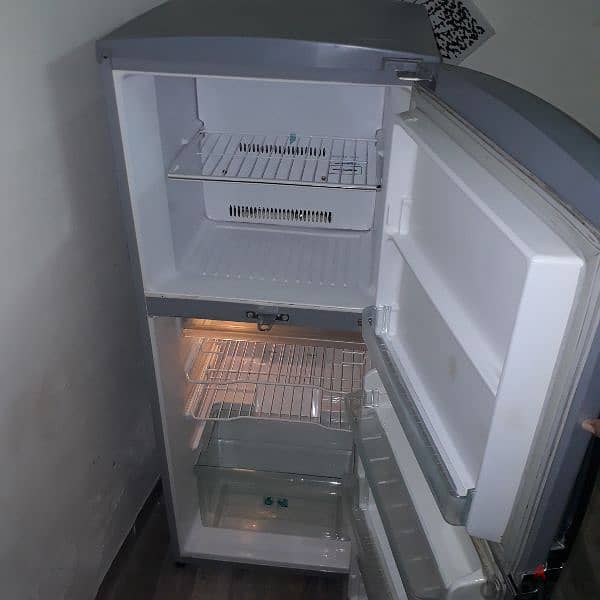 Medium size fridge 5feet 25bd working 1