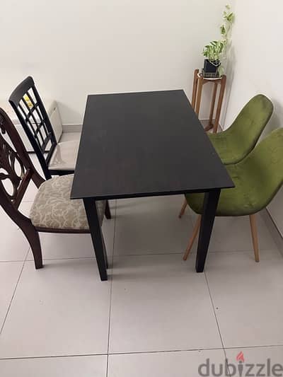 Solid dining table with four chairs