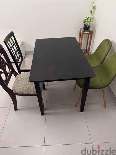 Solid dining table with four chairs 0