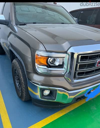 GMC 2015 HEADLIGHTS 100BD