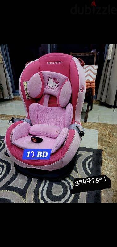 pink ,sturdy cozy and comfortable car seat for kids