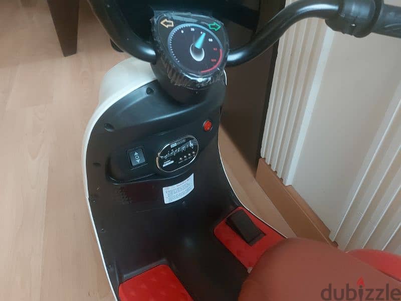 bd 25 ride on rechargeable battery scootor 1