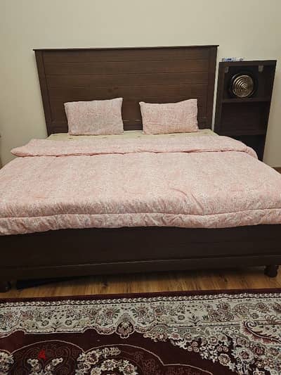 king size wooden bed with mattress