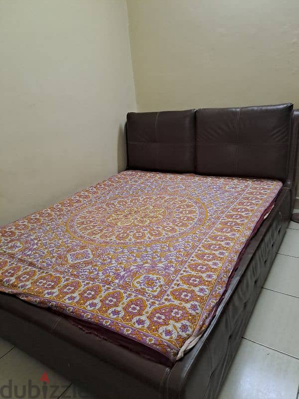 table with 5 chairs. , Queen size bed with mattress 1