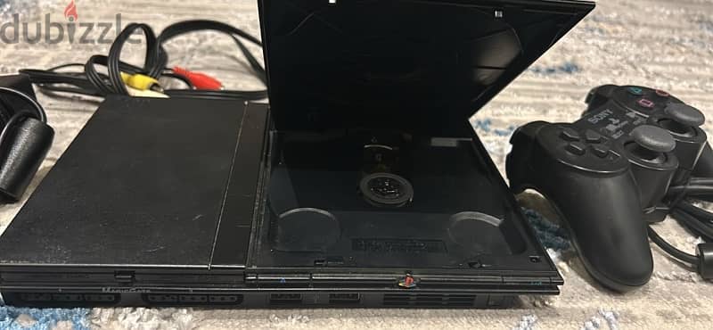 ps2 slim with cd games 1