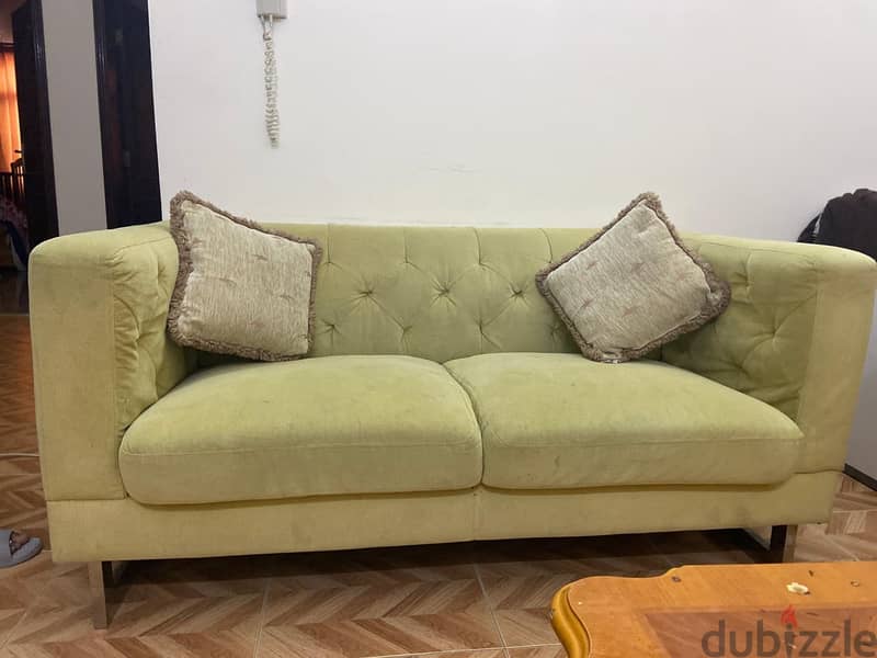 2 seater sofa with two pillows 1