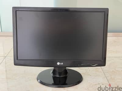 LG 19" LCD monitor along with a Keyboard and Mouse