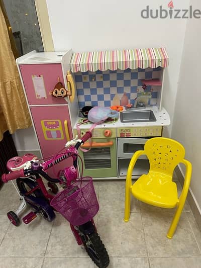 kids cycle, kitchen set and chair